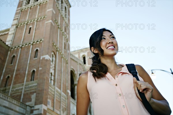 Korean student smiling on campus