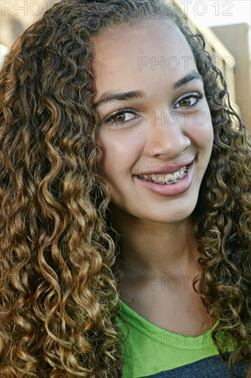 Mixed race girl smiling