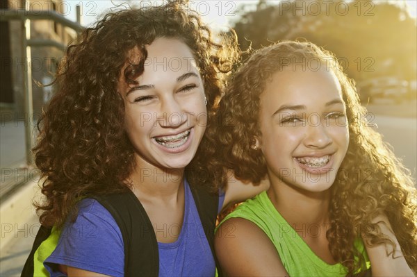 Mixed race girls smiling
