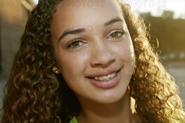 Mixed race girl smiling