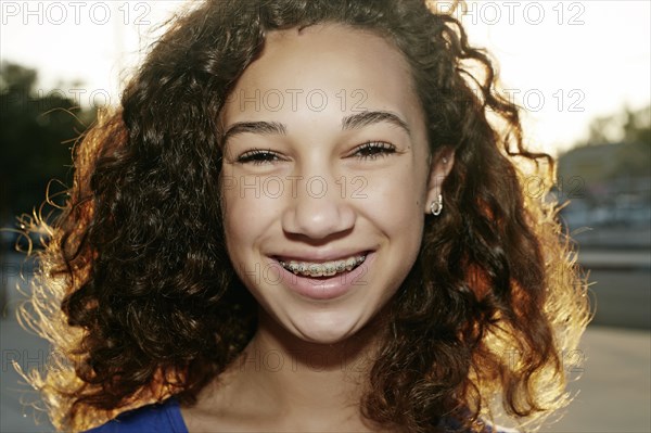 Mixed race girl smiling