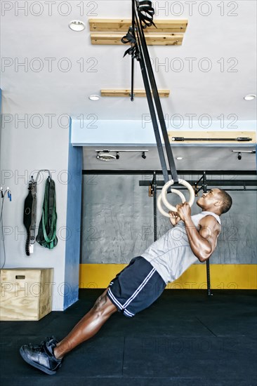 African American man working out in gym