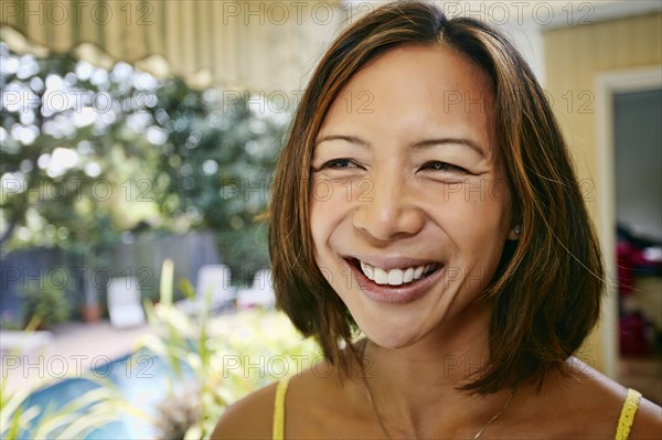 Mixed race woman smiling