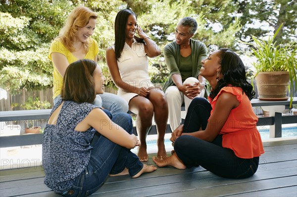 Women talking on patio