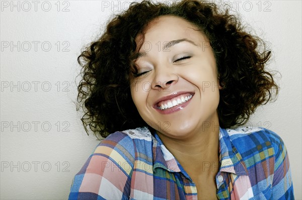 Mixed race woman smiling