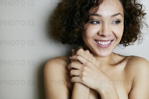 Mixed race woman smiling