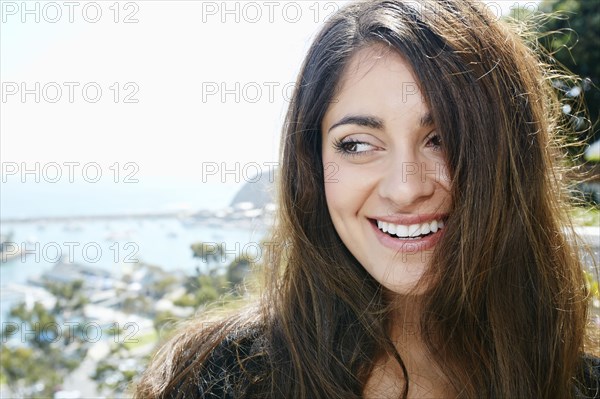 Close up of mixed race woman smiling