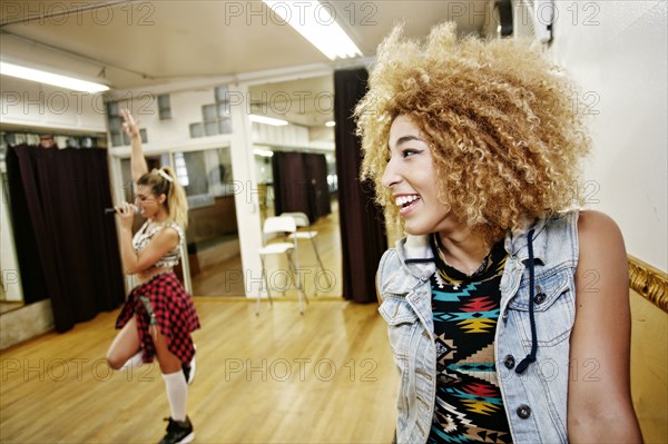 Dancer and singer rehearsing in studio