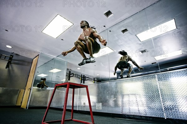 African American man working out in gym