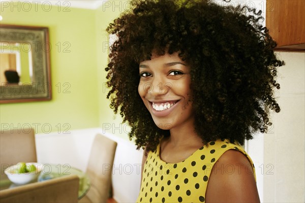 Close up of smiling mixed race woman