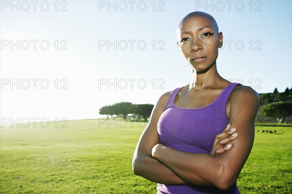 African American woman standing in park