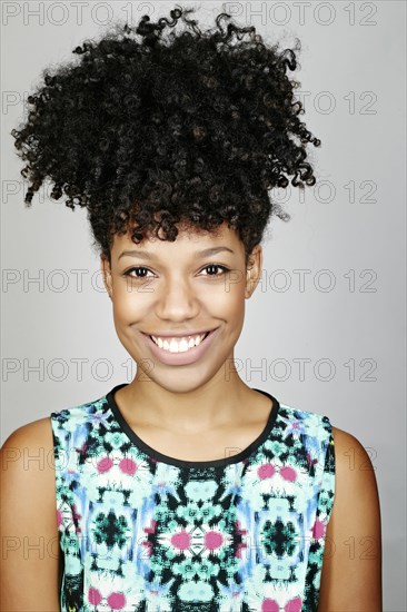 Close up of smiling mixed race woman