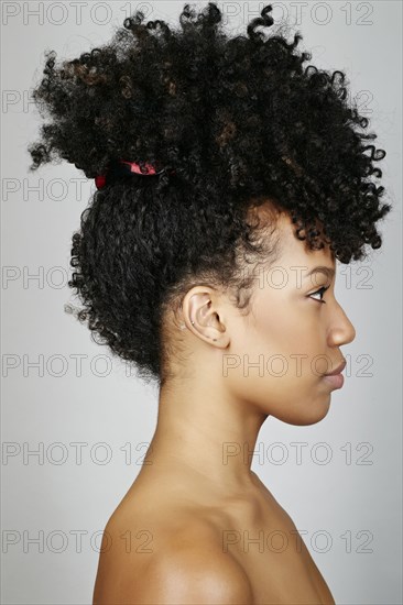 Close up profile of mixed race woman