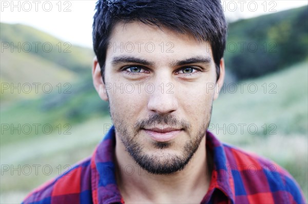 Caucasian man smiling outdoors