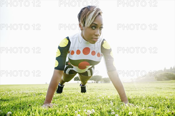 Black woman doing push