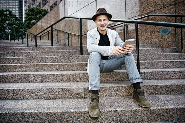 Caucasian businessman using digital tablet