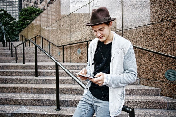 Caucasian businessman using digital tablet