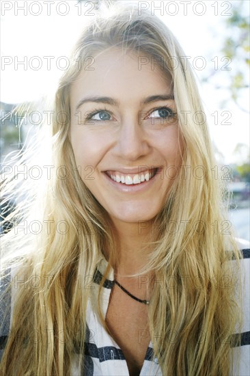 Caucasian woman smiling outdoors