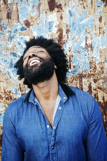 Mixed race man smiling outdoors