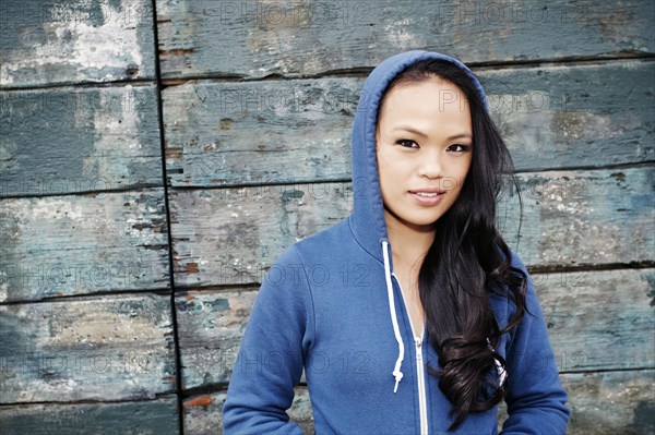 Asian woman wearing hoodie