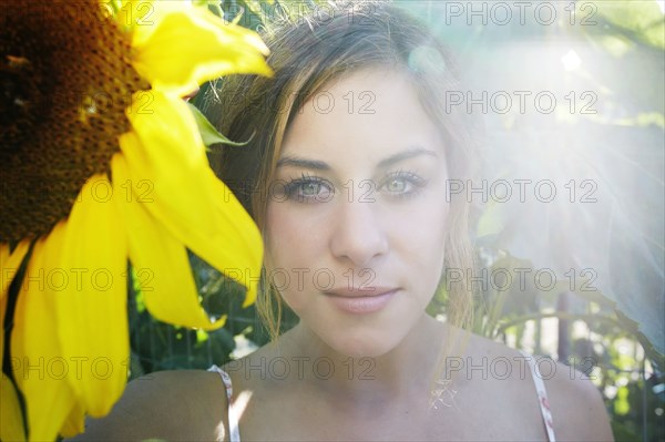 Mixed race woman in garden