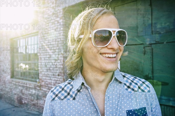 Caucasian man smiling outdoors