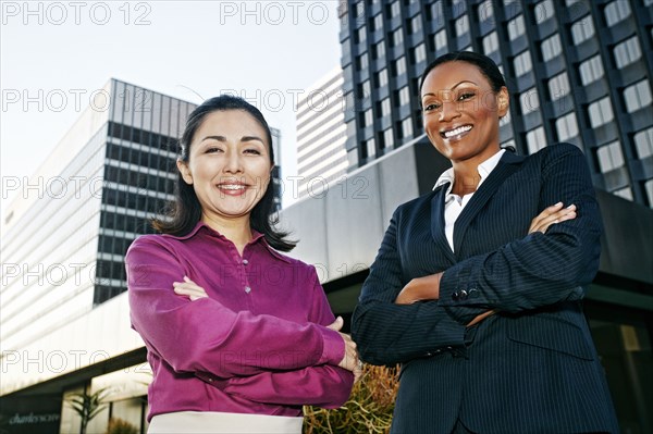 Businesswomen smiling outdoors