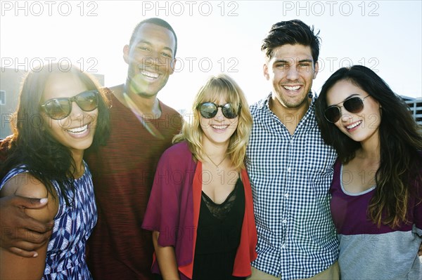 Friends smiling outdoors