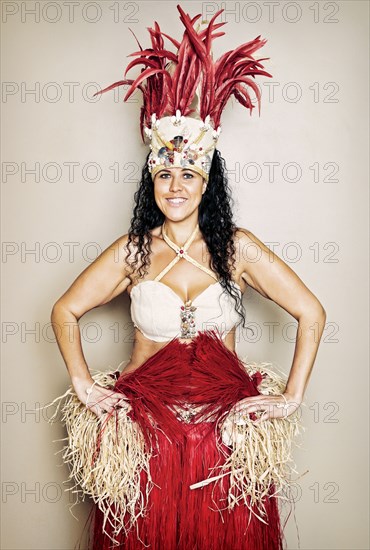 Mixed race hula dancer wearing traditional costume