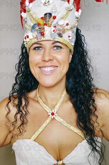 Mixed race hula dancer wearing traditional costume