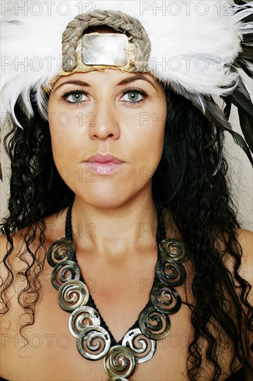 Mixed race hula dancer wearing traditional costume