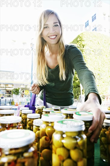 Caucasian woman shopping in farmers market