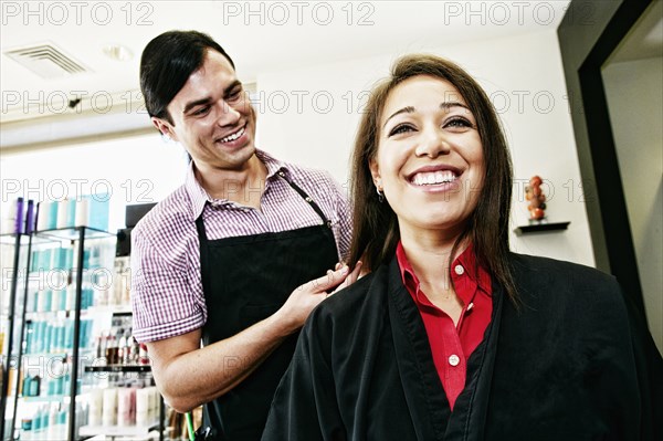 Hairdresser and customer in hair salon