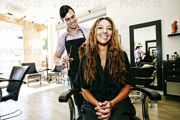 Hairdresser and customer in hair salon