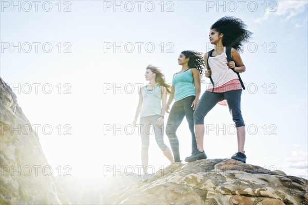 Women standing on rock