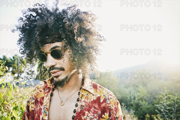 Mixed Race man wearing sunglasses