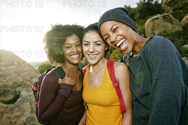 Portrait of smiling women hiking