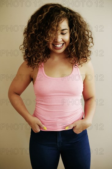 Portrait of laughing Mixed Race woman