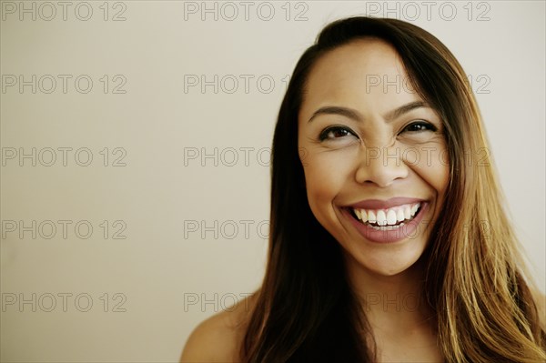 Portrait of laughing Asian woman