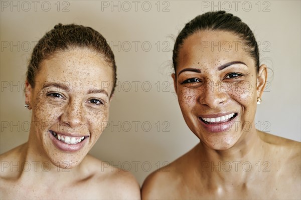 Close up of smiling mixed race women