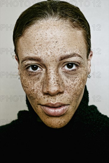 Close up of serious mixed race woman