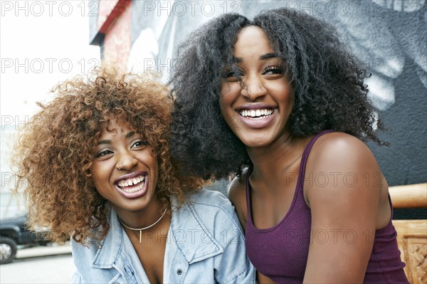 Women laughing outdoors