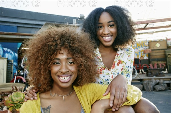 Women smiling outdoors