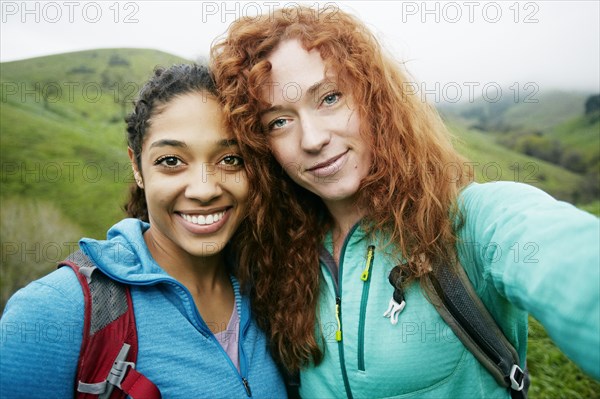 Portrait of smiling women hiking