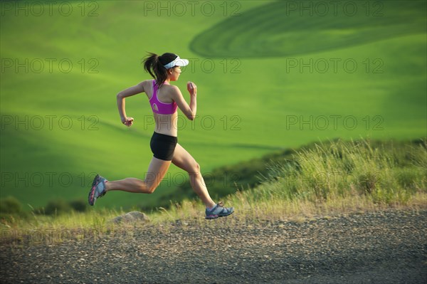 Japanese runner running in countryside