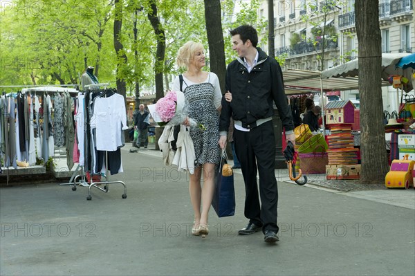 Caucasian couple at market