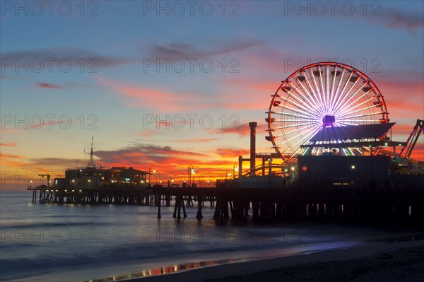 Amusement park on waterfront at night