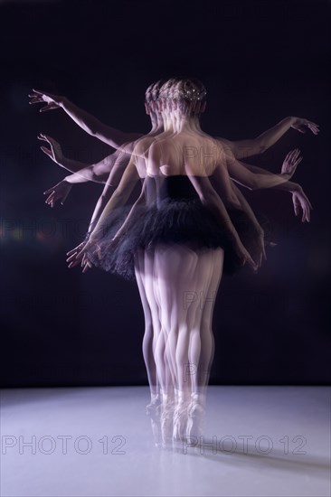 Caucasian ballerina dancing on stage