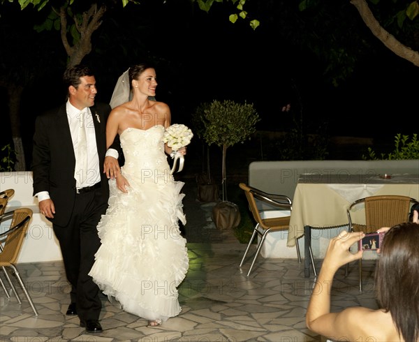 Bridal couple arriving at reception