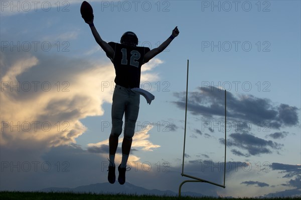 Football player cheering in game